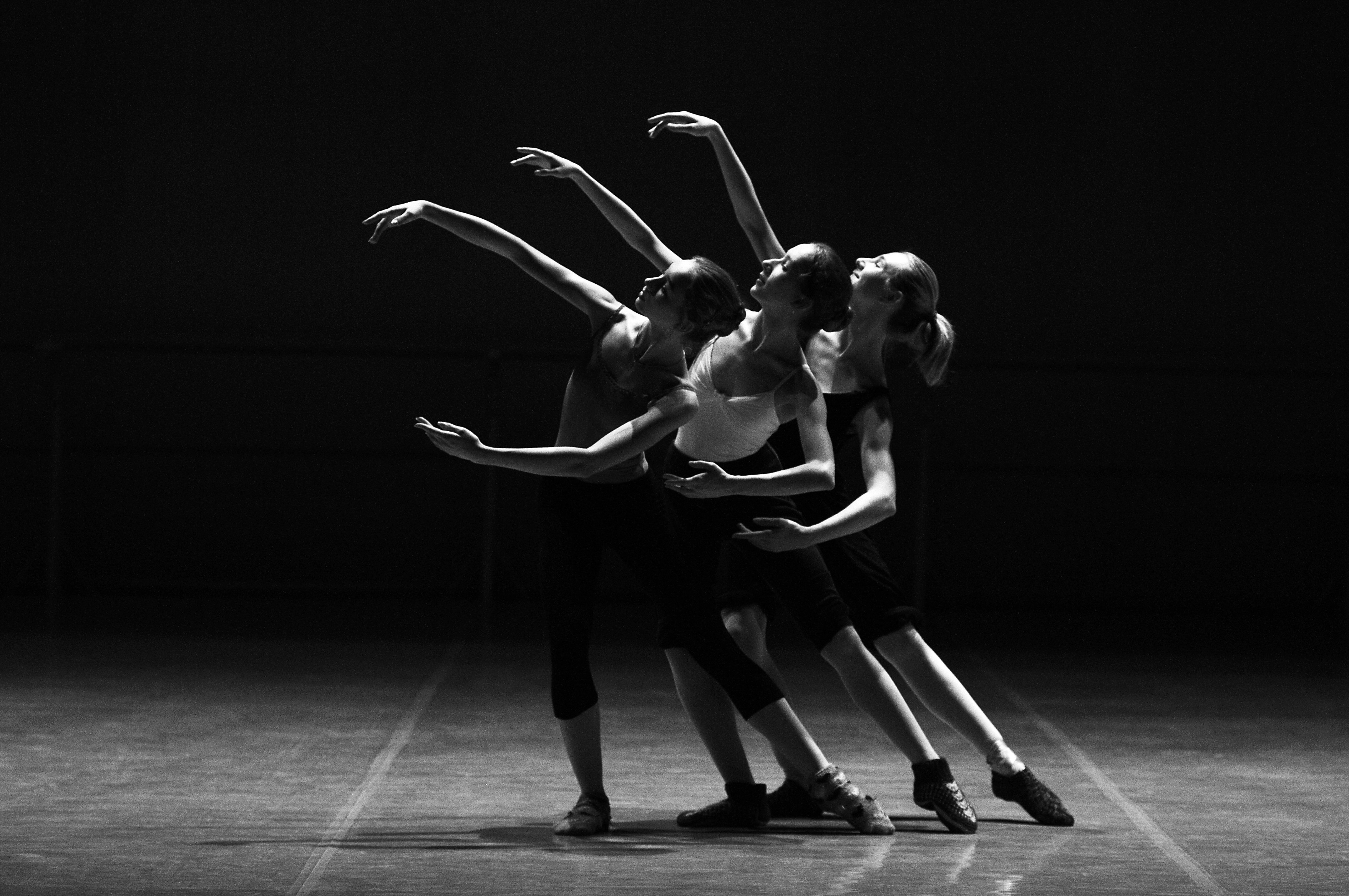 3 ballerinas dancing in black and white