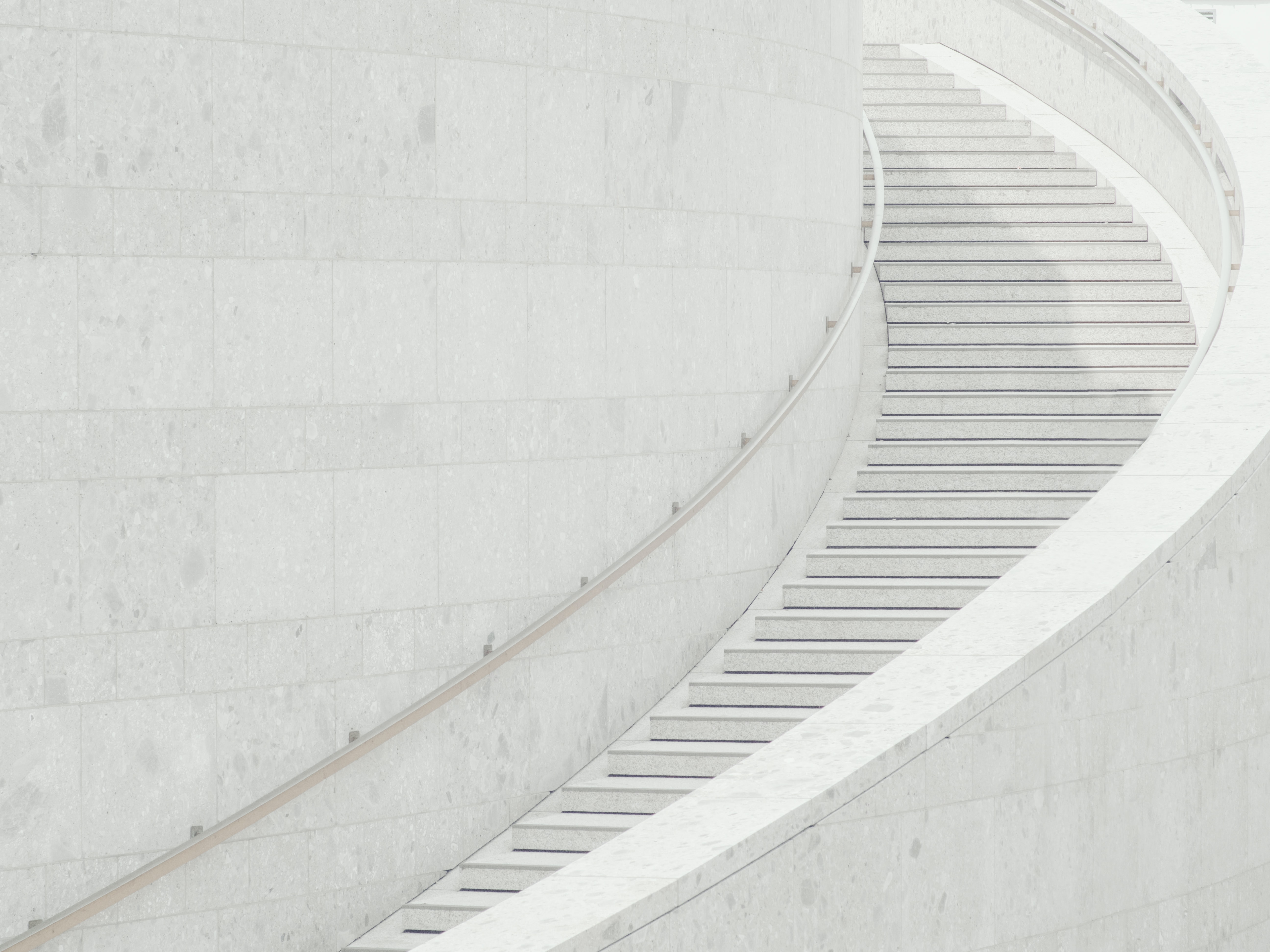 white wrap staircase in daylight